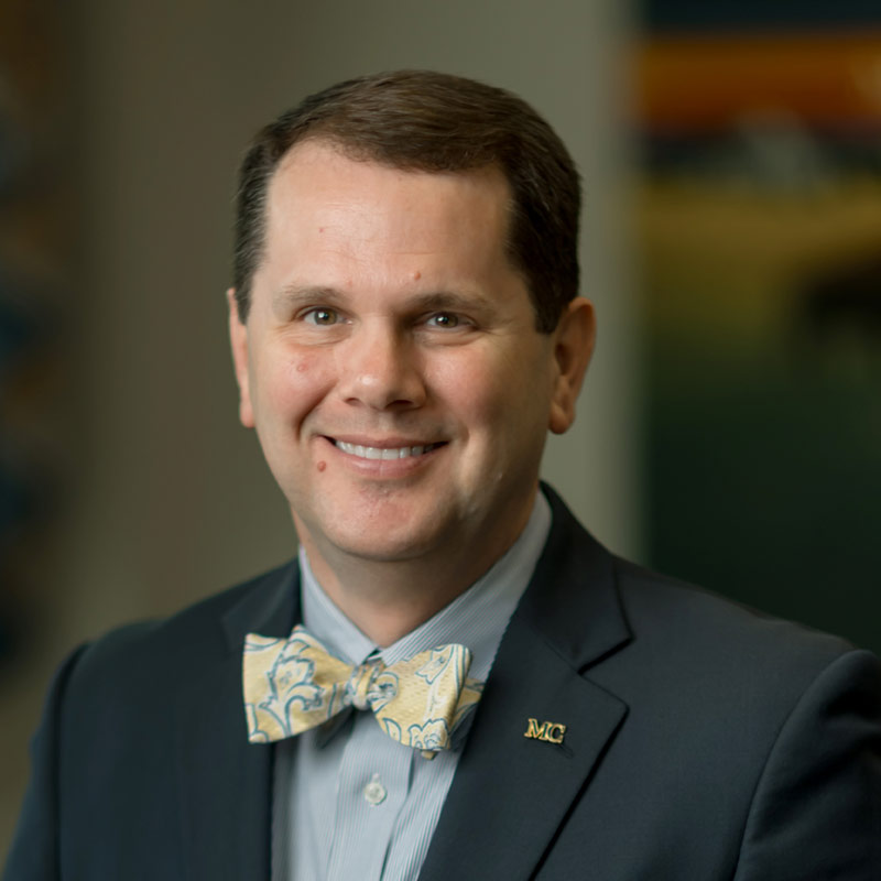 Dr. Blake Thompson, President